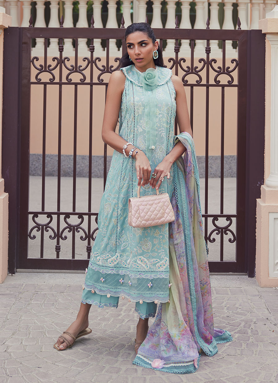 Model wearing aqua blue embroidered outfit from Farah Talib Aziz, Unstitched Luxury '25, perfect for Pakistani luxury pret fans in UK.
