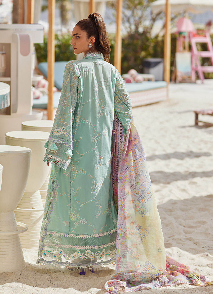 Model wearing aqua blue embroidered outfit from Farah Talib Aziz, Unstitched Luxury '25, perfect for Pakistani luxury pret fans in UK.