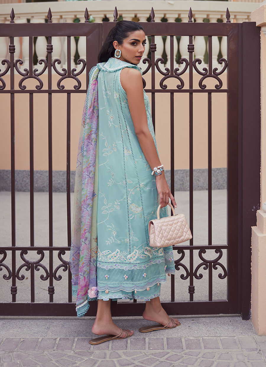 Model wearing aqua blue embroidered outfit from Farah Talib Aziz, Unstitched Luxury '25, perfect for Pakistani luxury pret fans in UK.
