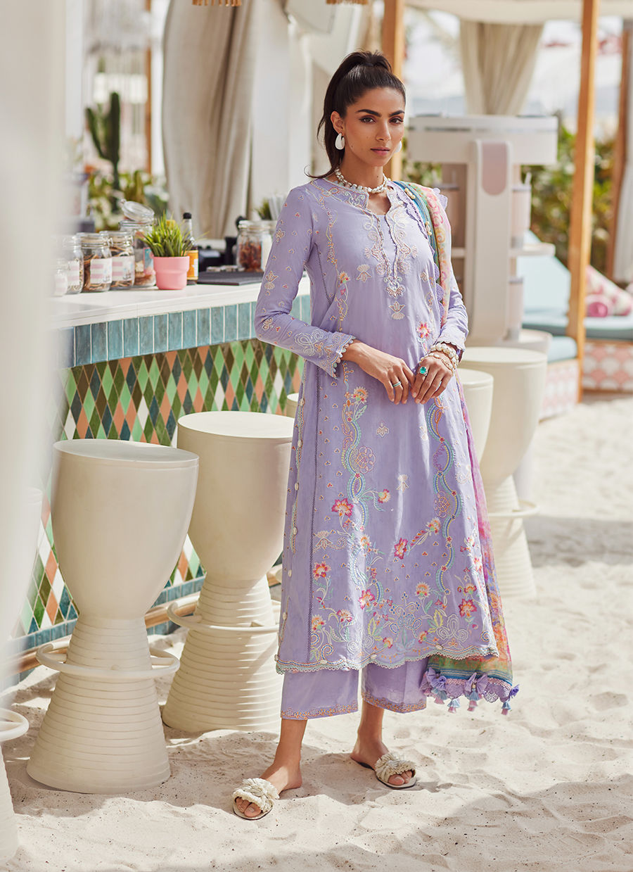 Model wearing lavender embroidered dress with printed dupatta from Farah Talib Aziz Liliana, Pakistani Luxury pret online in UK.