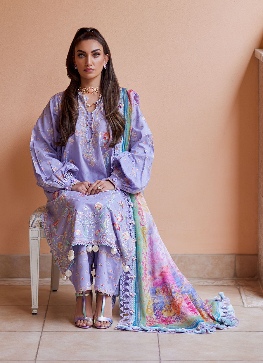 Model wearing lavender embroidered dress with printed dupatta from Farah Talib Aziz Liliana, Pakistani Luxury pret online in UK.
