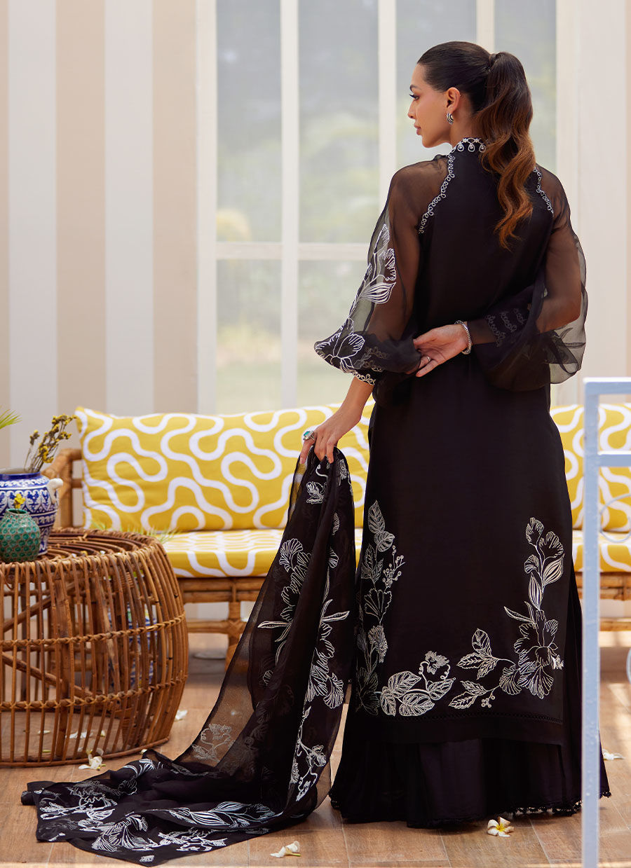 Model wearing black embroidered Reina Ebony outfit from Farah Talib Aziz Tara Luxe II, perfect for Pakistani luxury pret clothes online in UK.