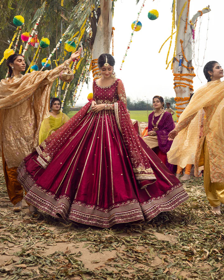 model wearing maroon dress by Faiza Saqlain, Pakistani luxury pret available online in UK for elegant festive wear