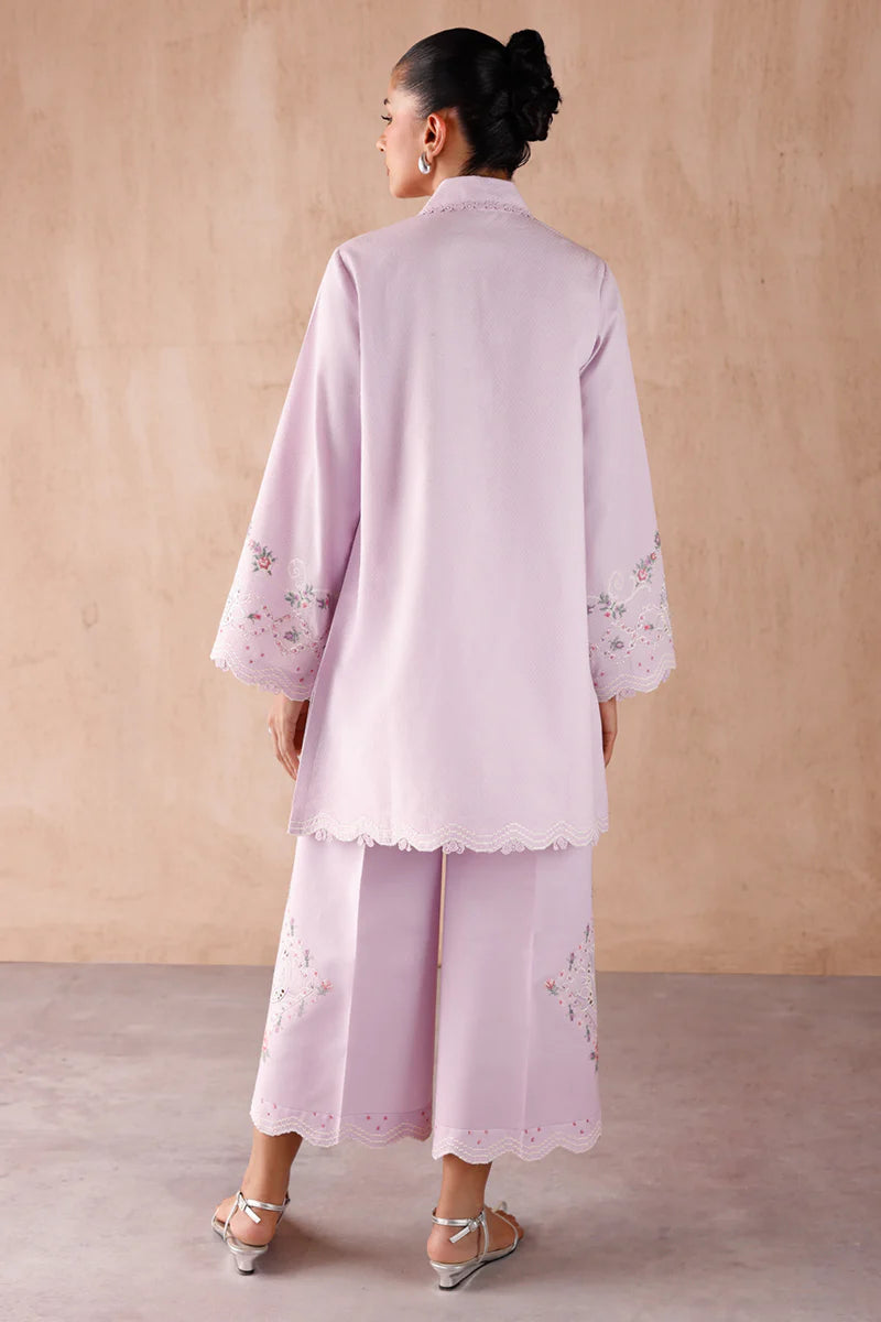 Model wearing lilac embroidered coords EP-03 Aira from Qalamkar, elegant Pakistani luxury pret available online in UK.