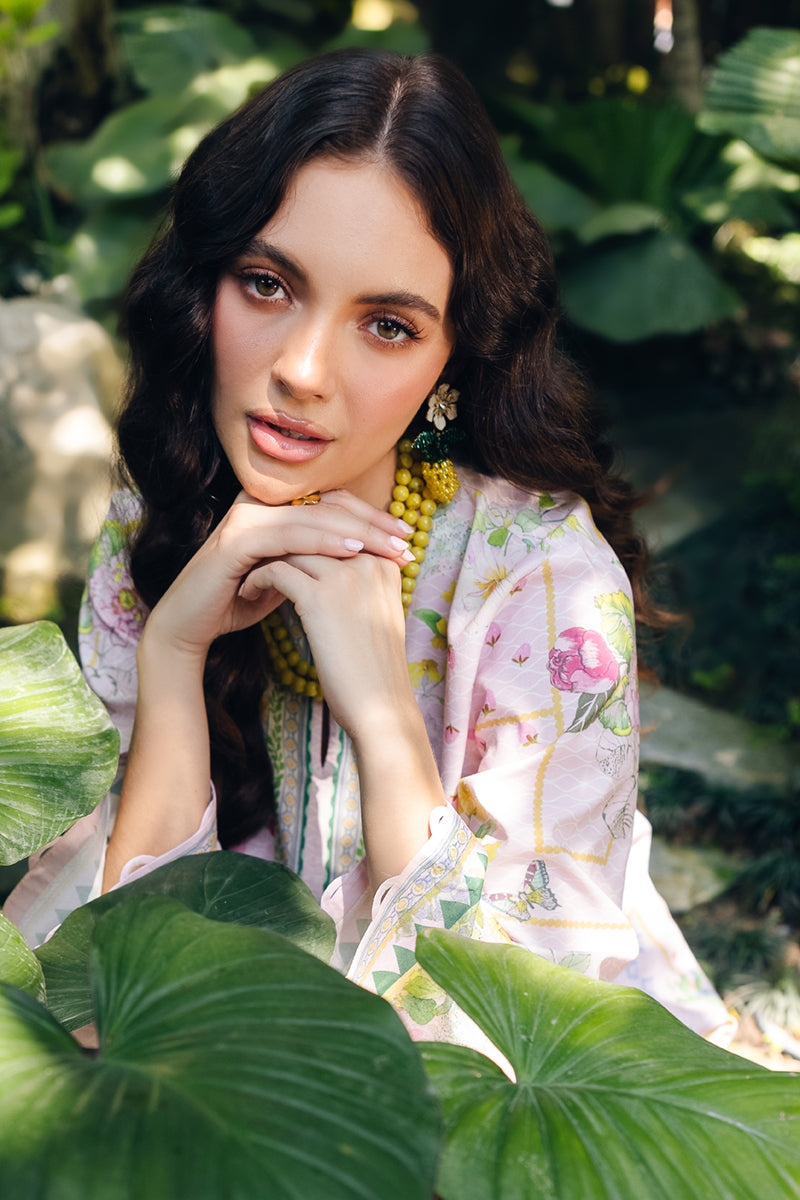 Model wearing OP-02 Elio, hemline detail, a Pakistani designer outfit by Qalamkar, available online in the UK.