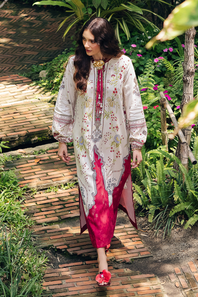 Model wearing OP-01 Lapo, side angle, a Pakistani designer outfit by Qalamkar, available online in the UK.