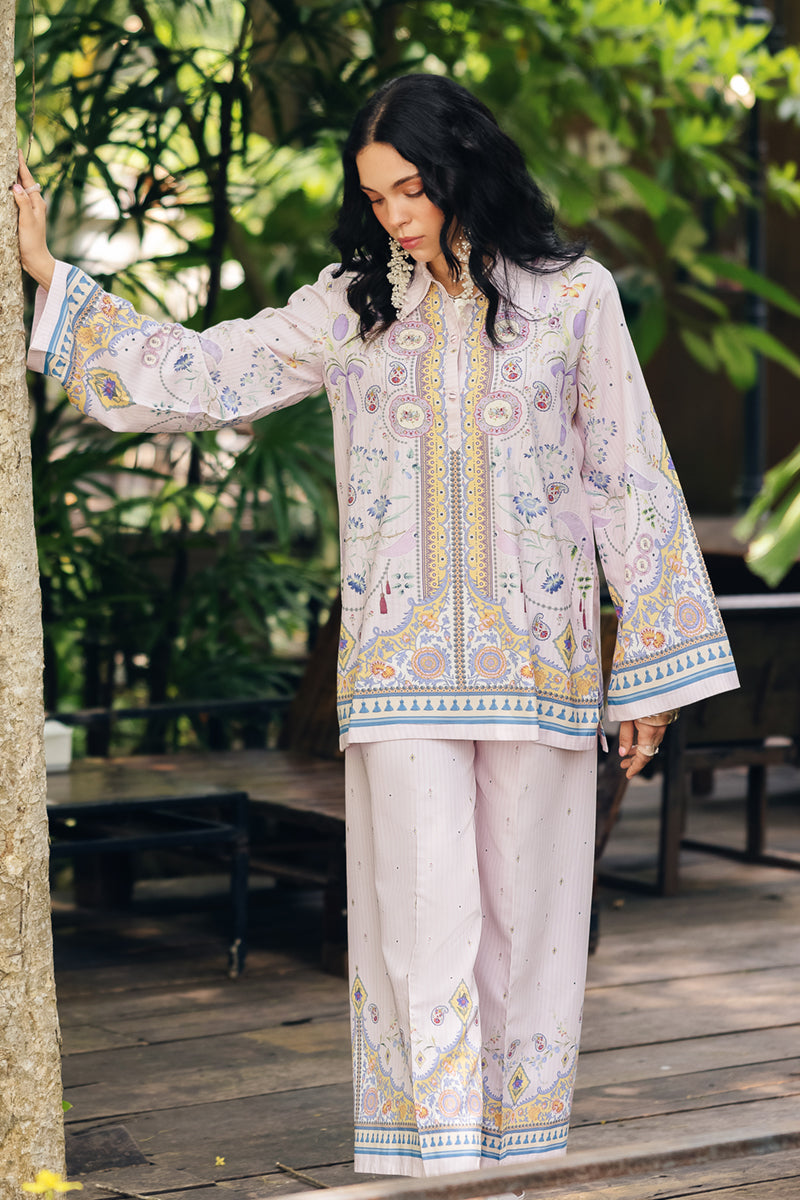 Model wearing OP-08 Ruhi, sleeves close-up, a Pakistani designer outfit by Qalamkar, available online in the UK.