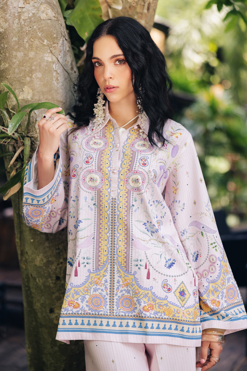Model wearing OP-08 Ruhi, hemline detail, a Pakistani designer outfit by Qalamkar, available online in the UK.