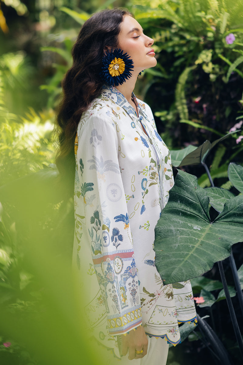 Model wearing OP-06 Ilsa, side angle, a Pakistani designer outfit by Qalamkar, available online in the UK.