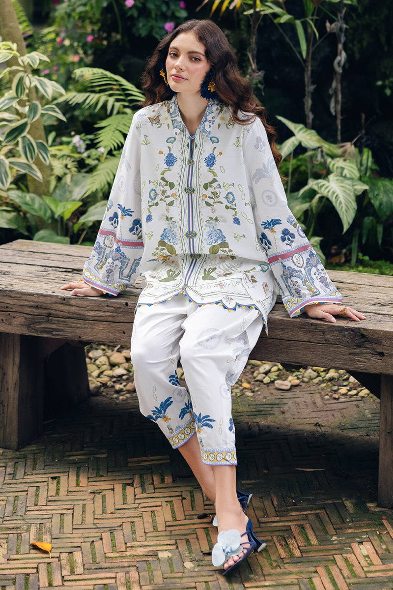 Model wearing OP-06 Ilsa, embroidery focus, a Pakistani designer outfit by Qalamkar, available online in the UK.