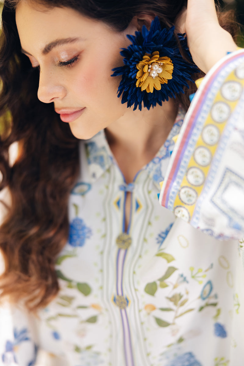 Model wearing OP-06 Ilsa, hemline detail, a Pakistani designer outfit by Qalamkar, available online in the UK.