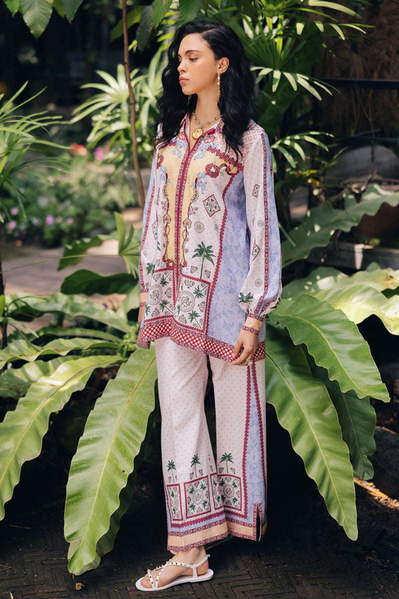 Model wearing OP-05 Rihana, back view, a Pakistani designer outfit by Qalamkar, available online in the UK.