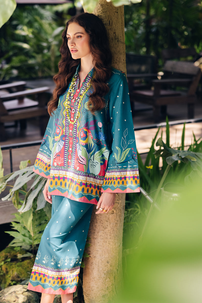 Model wearing OP-10 Liva, back view, a Pakistani designer outfit by Qalamkar, available online in the UK.