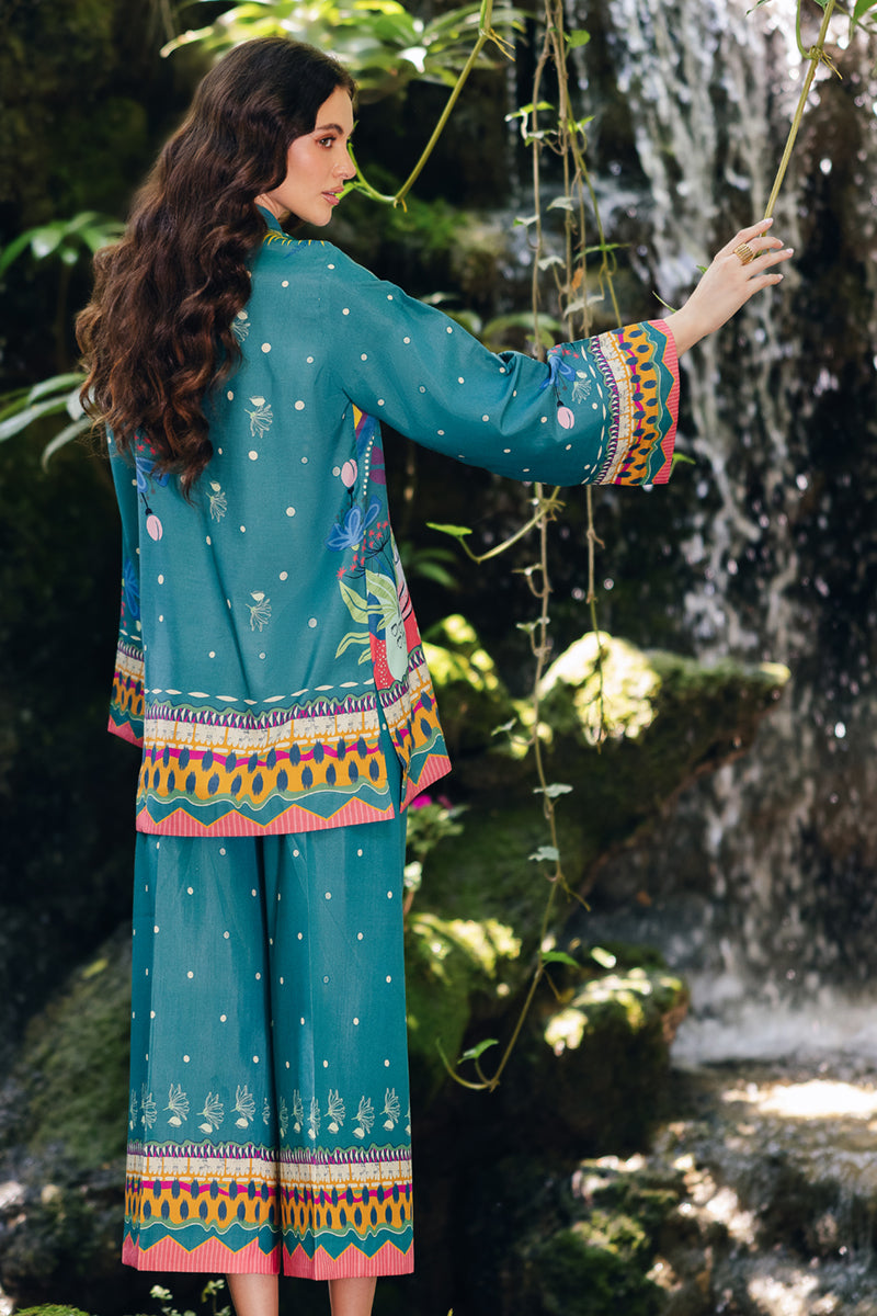 Model wearing OP-10 Liva, sleeves close-up, a Pakistani designer outfit by Qalamkar, available online in the UK.