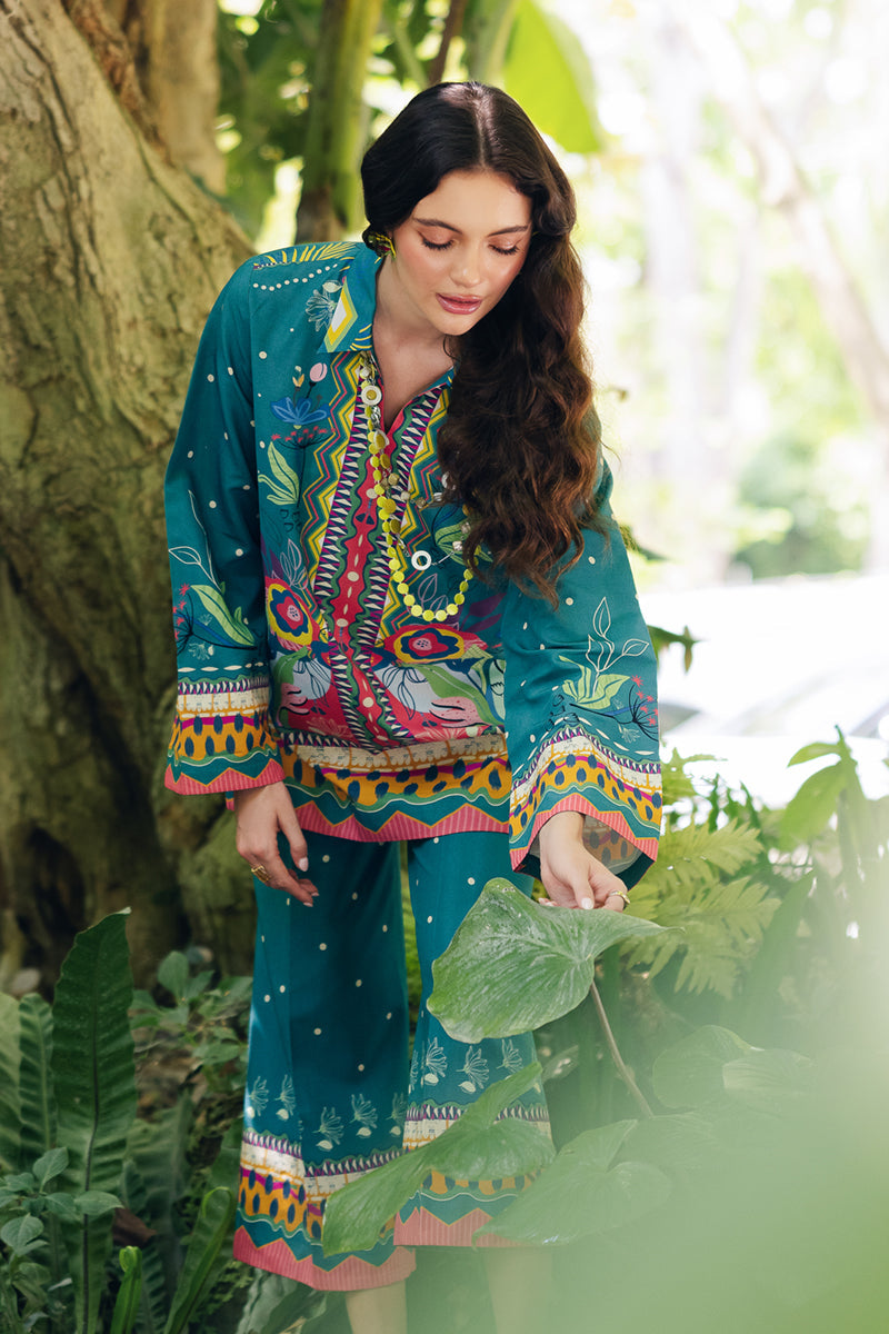 Model wearing OP-10 Liva, model styling view, a Pakistani designer outfit by Qalamkar, available online in the UK.