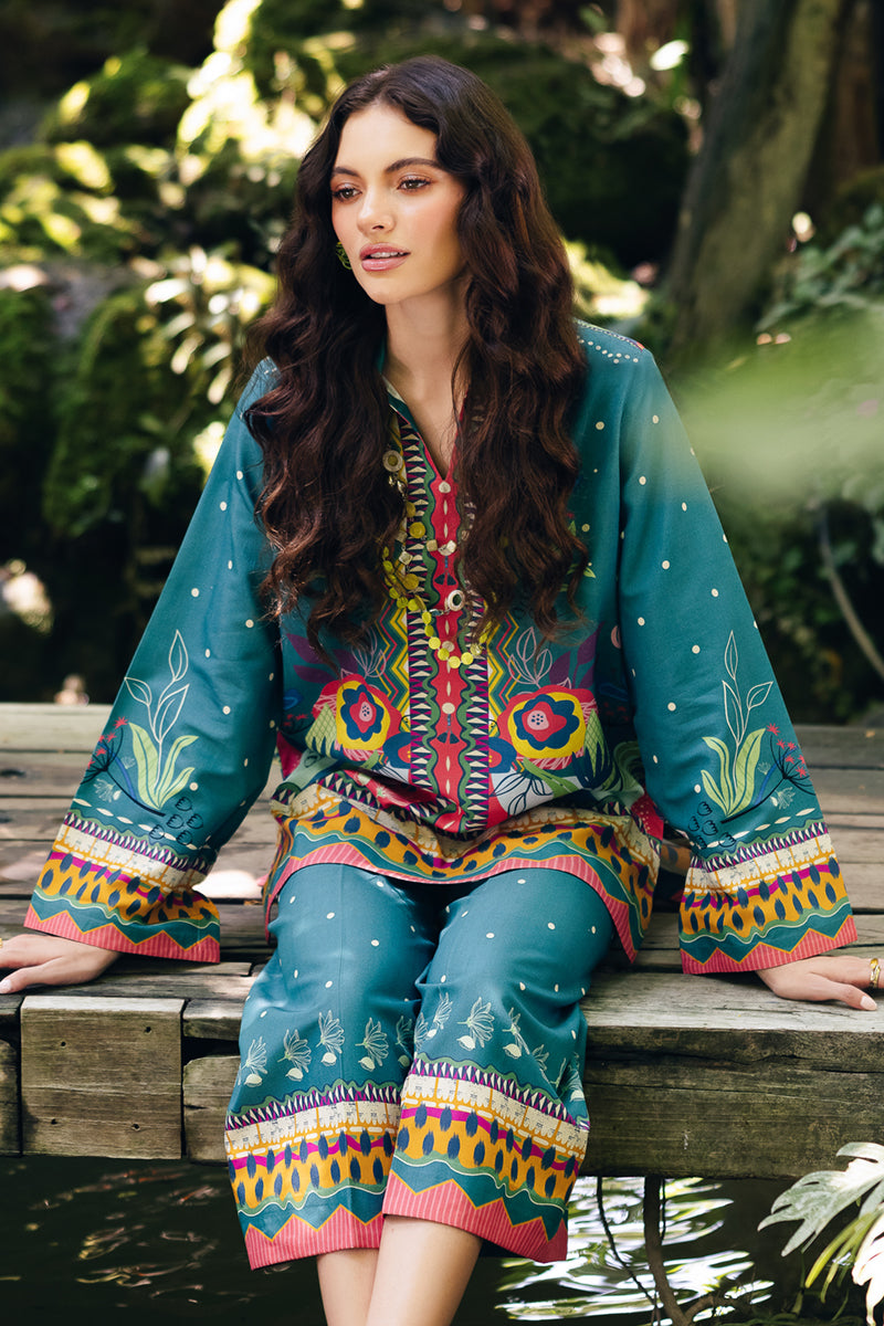 Model wearing OP-10 Liva, hemline detail, a Pakistani designer outfit by Qalamkar, available online in the UK.
