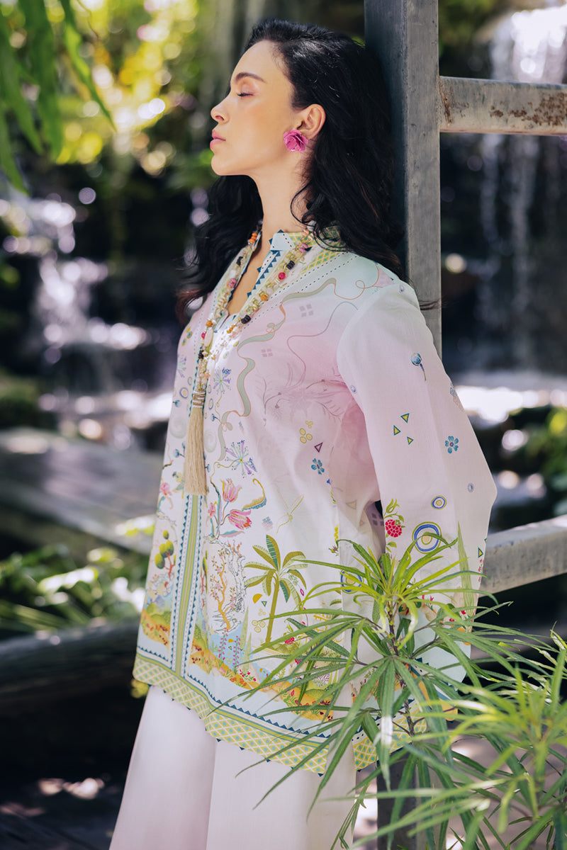 Model wearing OP-09 Sigr, three-quarter view, a Pakistani designer outfit by Qalamkar, available online in the UK.