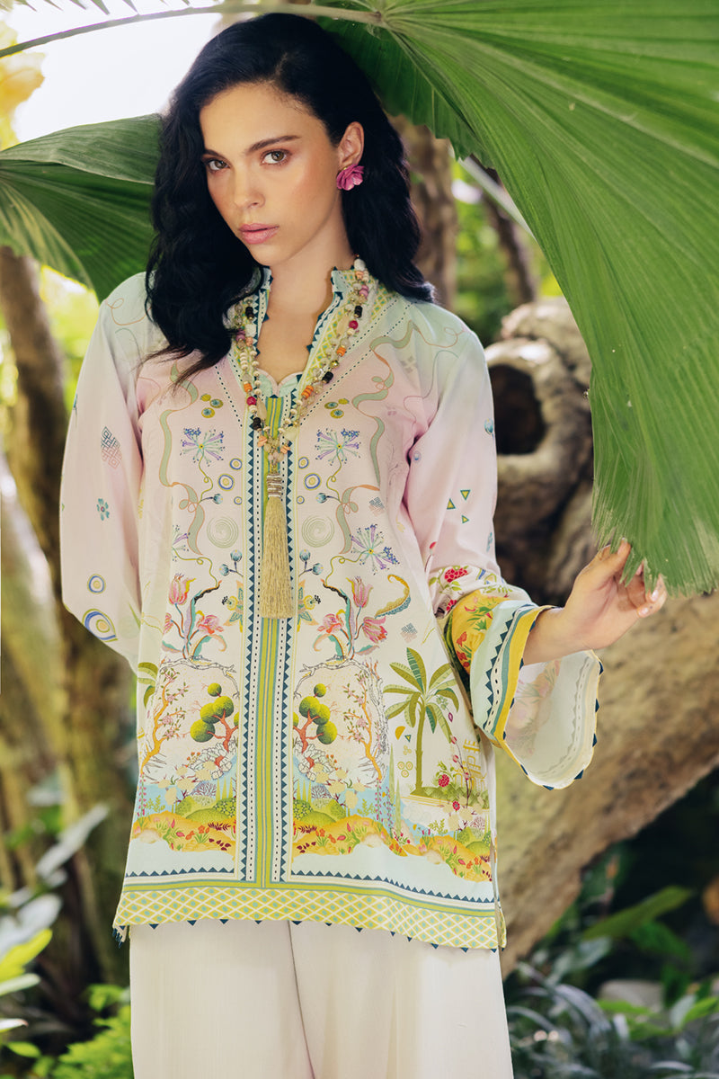 Model wearing OP-09 Sigr, hemline detail, a Pakistani designer outfit by Qalamkar, available online in the UK.