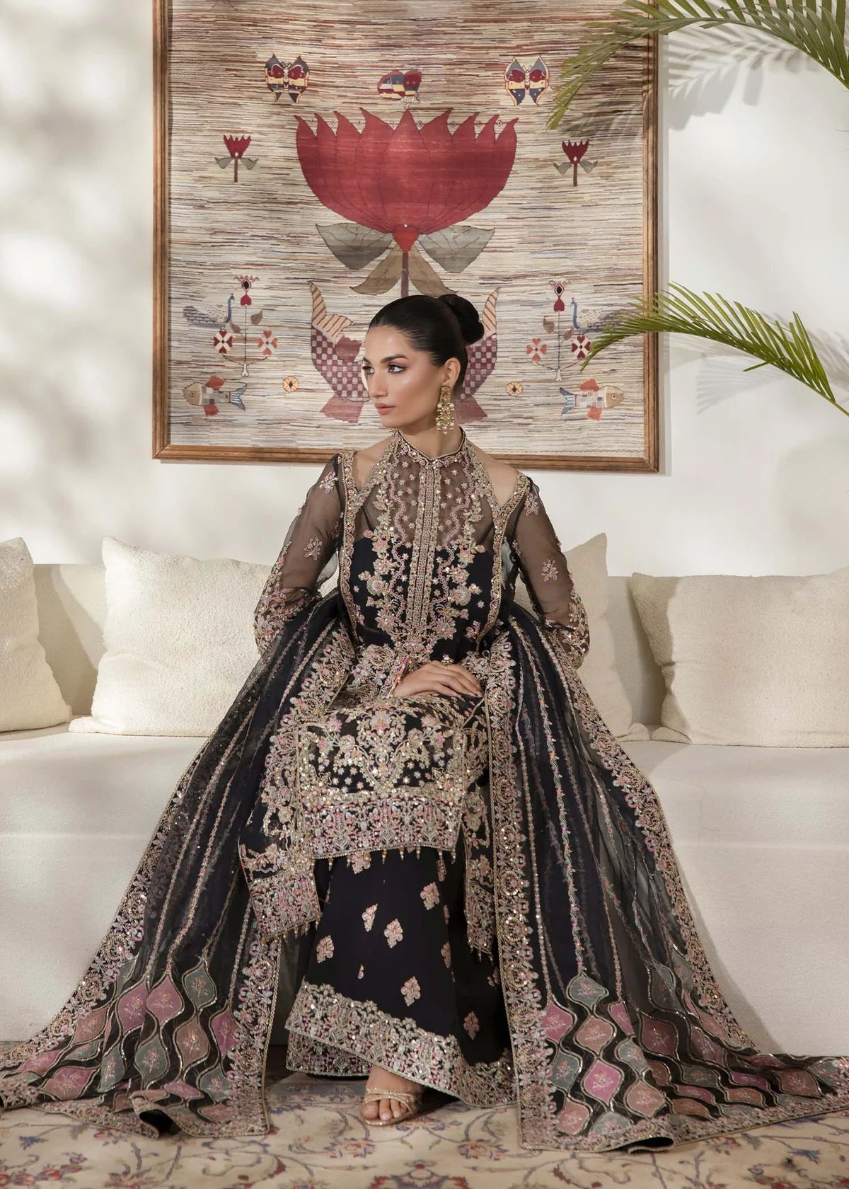 Model wearing black Rama outfit from Kanwal Malik with intricate embroidery—Pakistani luxury pret available online in UK.