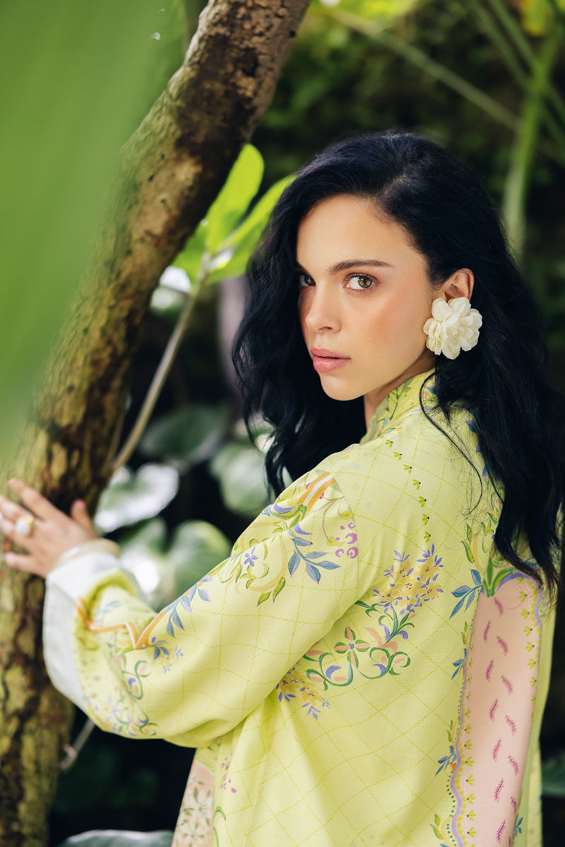 Model wearing OP-03 Alva, side angle, a Pakistani designer outfit by Qalamkar, available online in the UK.