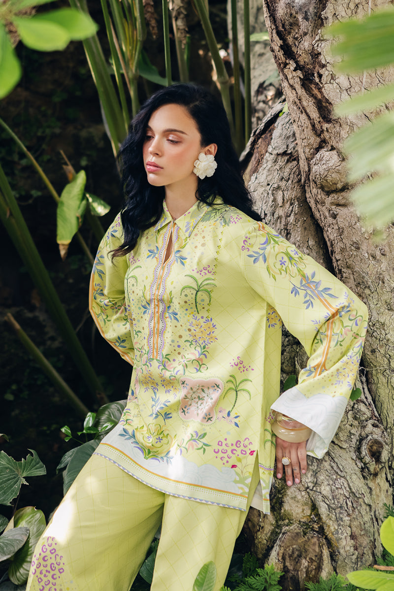 Model wearing OP-03 Alva, three-quarter view, a Pakistani designer outfit by Qalamkar, available online in the UK.