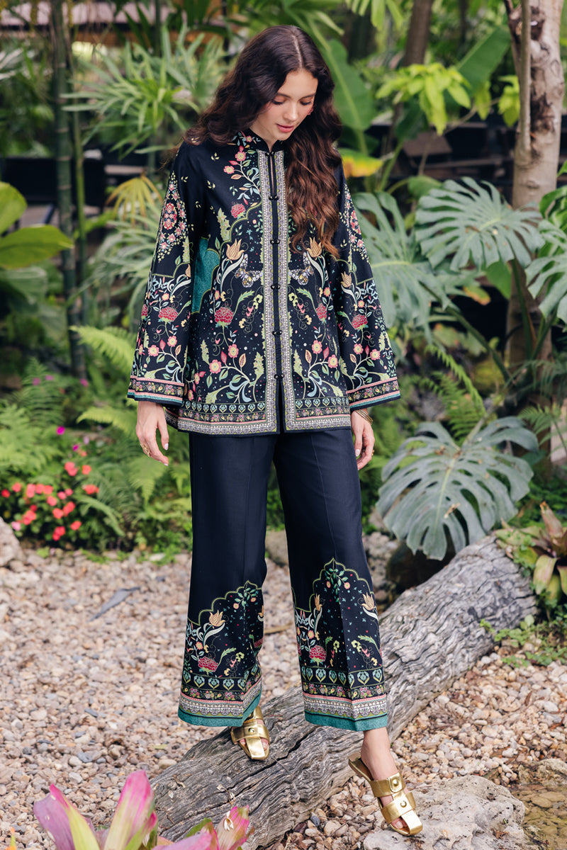 Model wearing OP-07 Rane, back view, a Pakistani designer outfit by Qalamkar, available online in the UK.