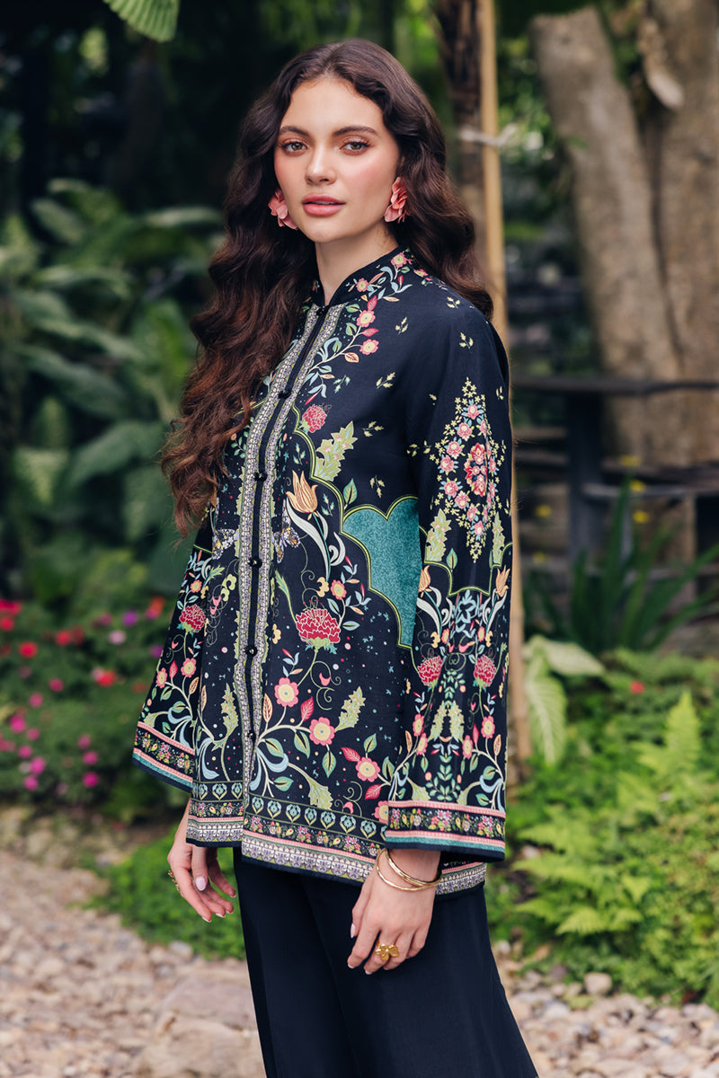 Model wearing OP-07 Rane, side angle, a Pakistani designer outfit by Qalamkar, available online in the UK.