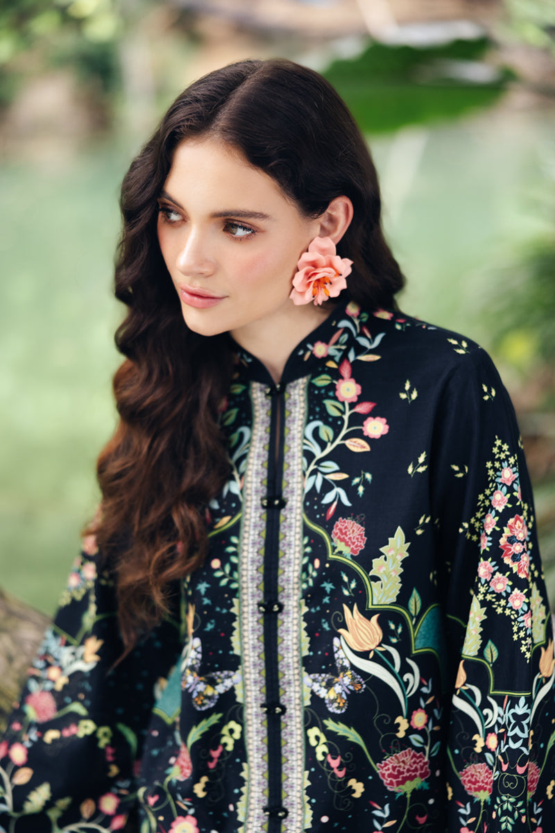 Model wearing OP-07 Rane, hemline detail, a Pakistani designer outfit by Qalamkar, available online in the UK.