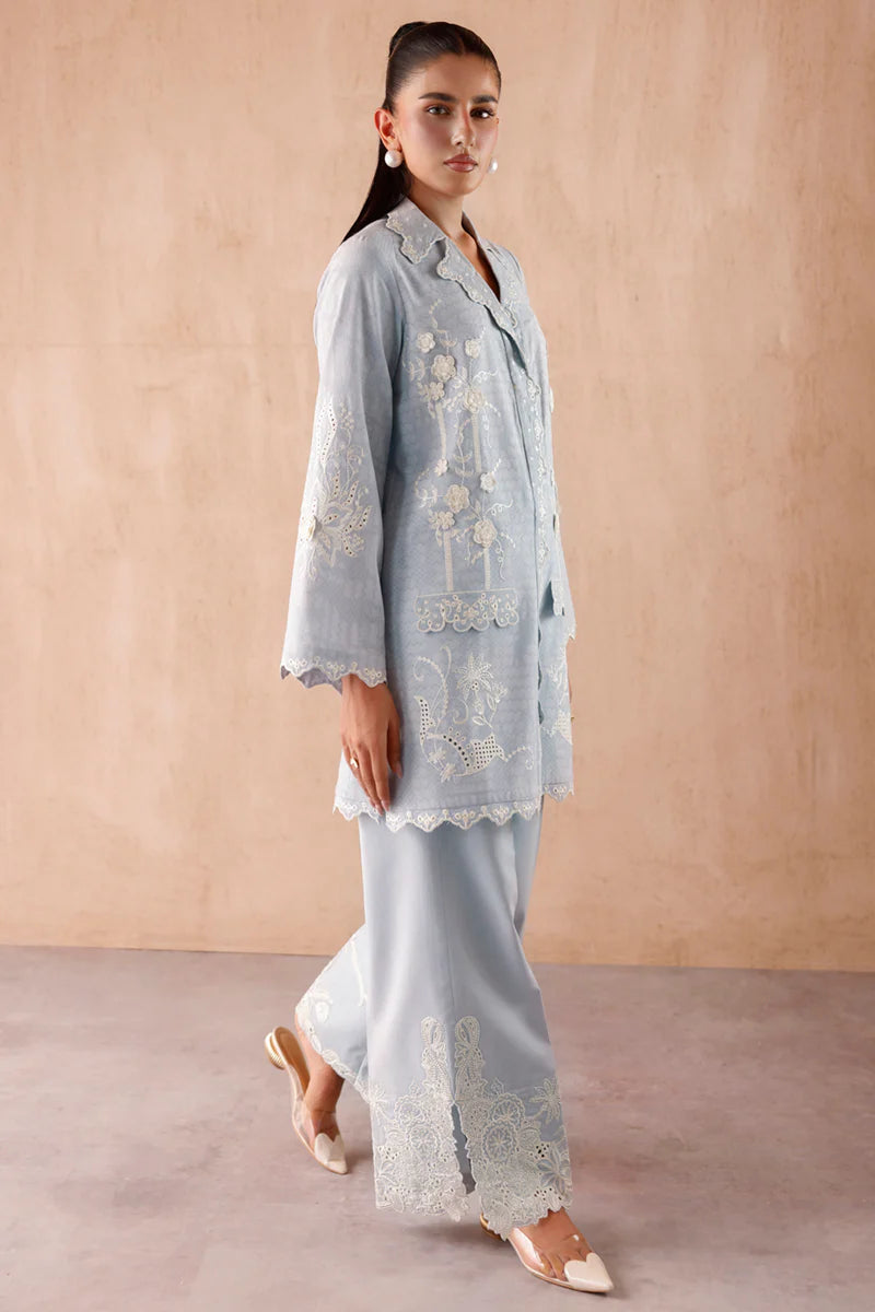 Model wearing Light Blue embroidered coords EP-05 Gaya from Qalamkar, Pakistani luxury pret available online in UK.