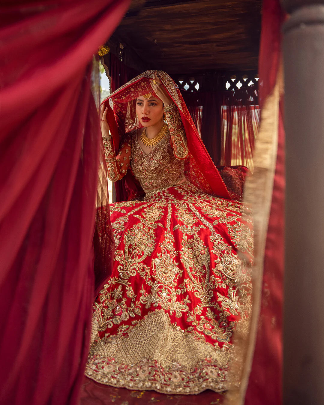 model wearing red dress by Faiza Saqlain, Pakistani luxury pret ideal for online shopping in the UK