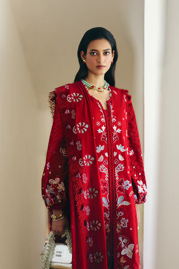 Model wearing deep red embroidered dress from Suffuse Casual Pret 2025 Crimsal. Pakistani luxury pret and Pakistani clothes online in UK.