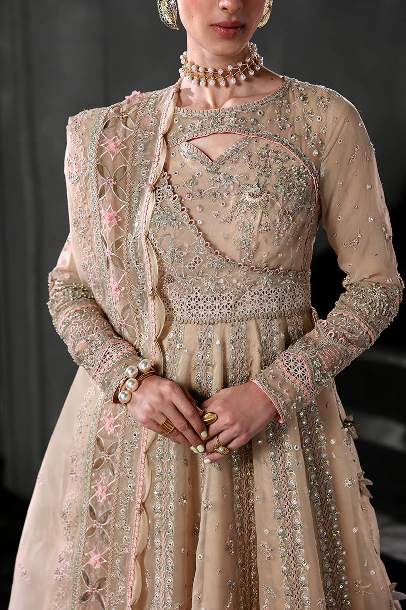 Model wearing MF-01 Lustra by Qalamkar in peach pink hand-embellished dress – Pakistani luxury pret perfect for festive wear, shop online in UK.