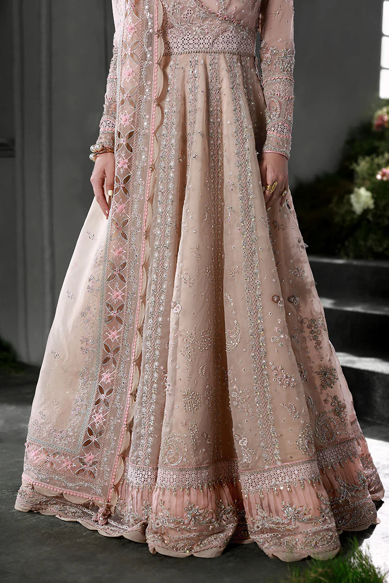 Model wearing MF-01 Lustra by Qalamkar in peach pink hand-embellished dress – Pakistani luxury pret perfect for festive wear, shop online in UK.