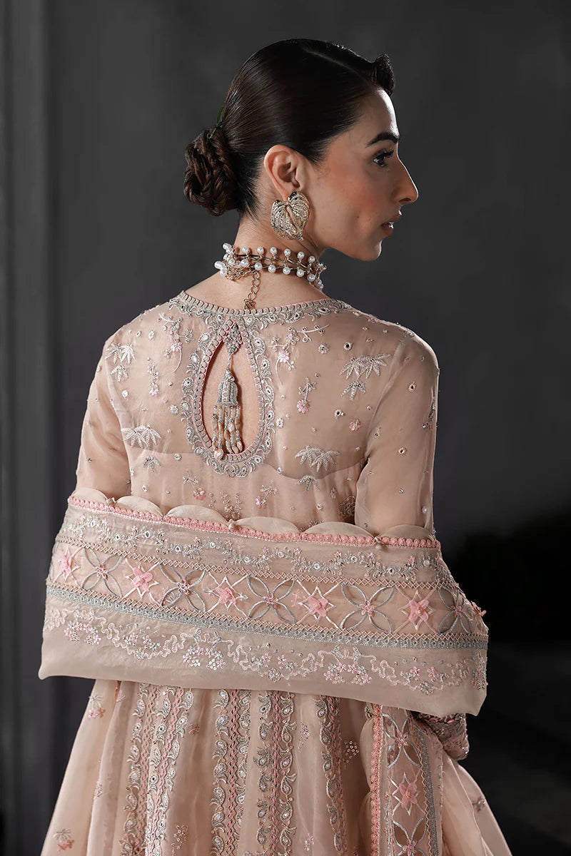 Model wearing MF-01 Lustra by Qalamkar in peach pink hand-embellished dress – Pakistani luxury pret perfect for festive wear, shop online in UK.