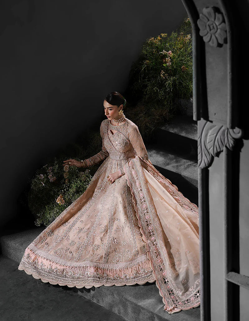 Model wearing MF-01 Lustra by Qalamkar in peach pink hand-embellished dress – Pakistani luxury pret perfect for festive wear, shop online in UK.