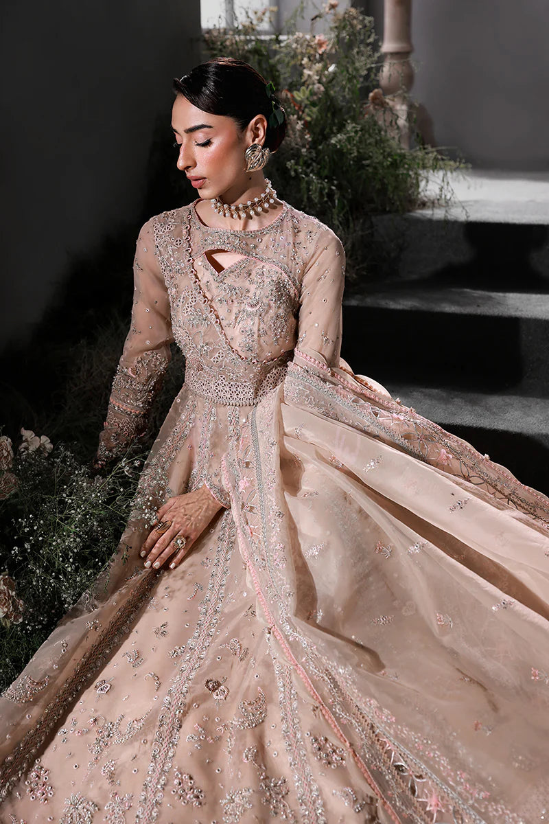 Model wearing MF-01 Lustra by Qalamkar in peach pink hand-embellished dress – Pakistani luxury pret perfect for festive wear, shop online in UK.