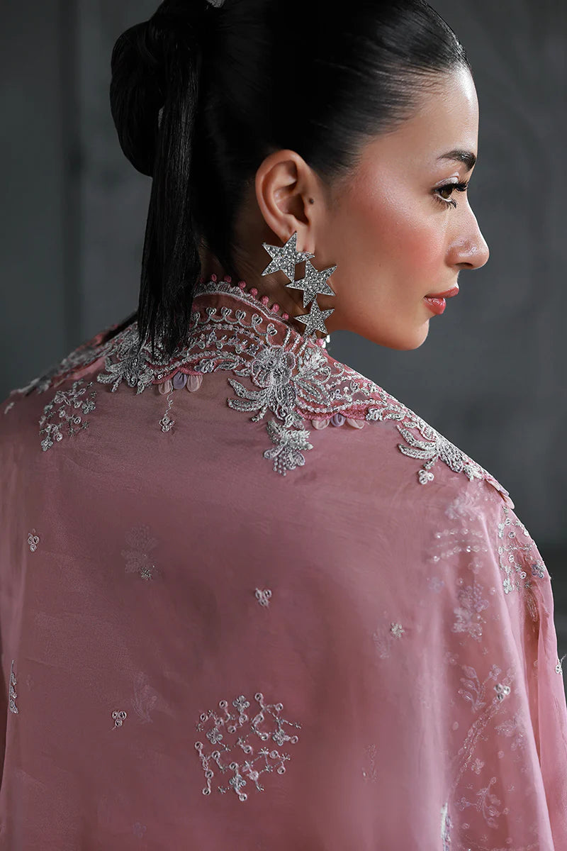Model wearing MF-07 Rosalyn by Qalamkar in rose pink hand-embroidered dress – Pakistani luxury pret perfect for festive wear, shop online in UK.