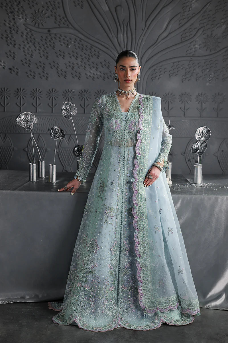 Model wearing MF-08 Serene Aqua by Qalamkar in aqua blue hand-embroidered dress – Pakistani luxury pret perfect for festive wear, shop online in UK.