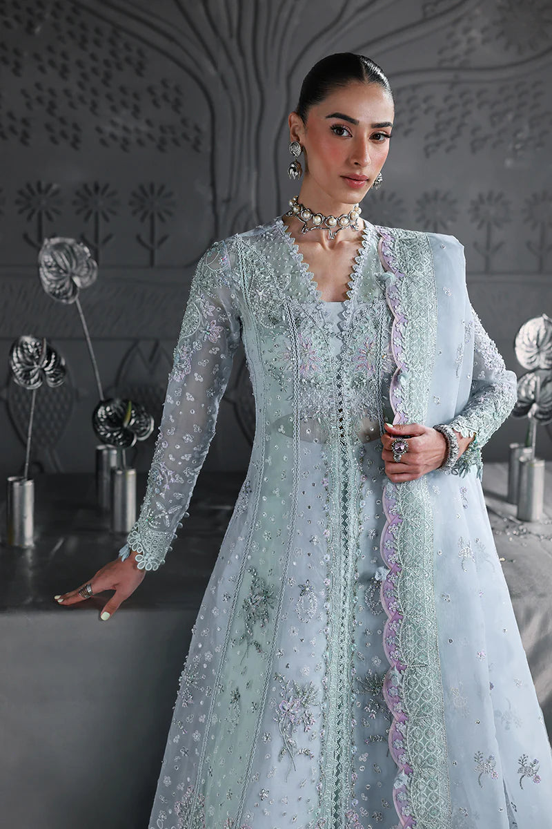 Model wearing MF-08 Serene Aqua by Qalamkar in aqua blue hand-embroidered dress – Pakistani luxury pret perfect for festive wear, shop online in UK.