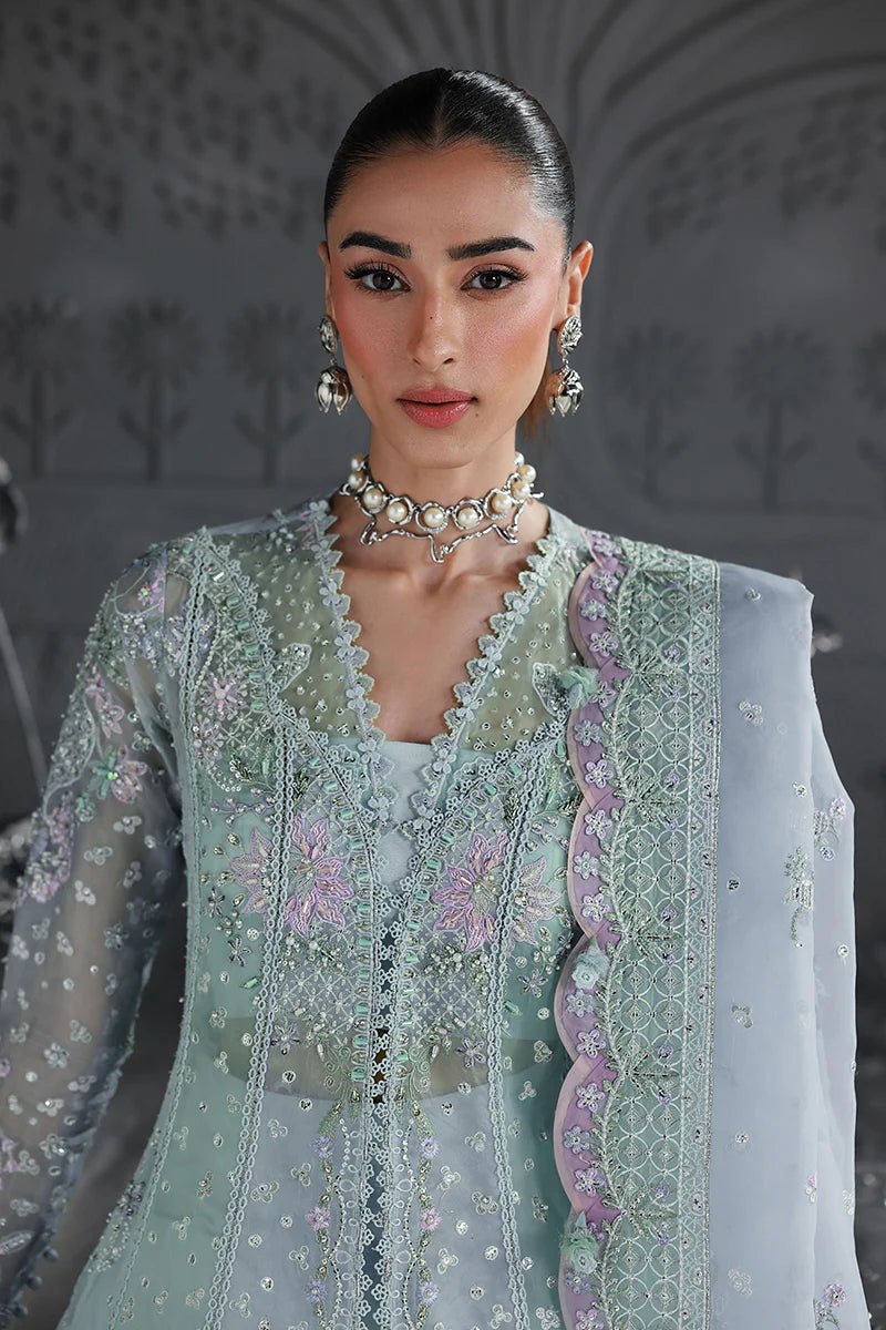 Model wearing MF-08 Serene Aqua by Qalamkar in aqua blue hand-embroidered dress – Pakistani luxury pret perfect for festive wear, shop online in UK.