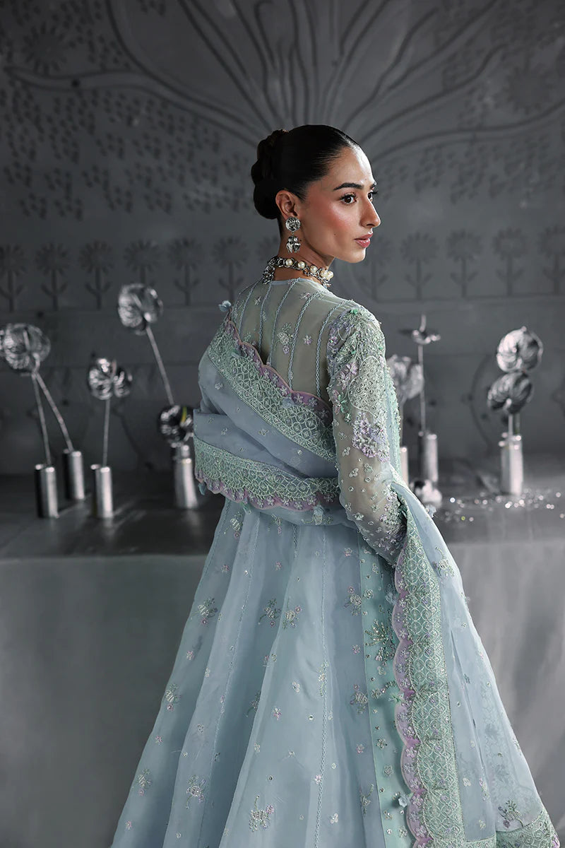 Model wearing MF-08 Serene Aqua by Qalamkar in aqua blue hand-embroidered dress – Pakistani luxury pret perfect for festive wear, shop online in UK.