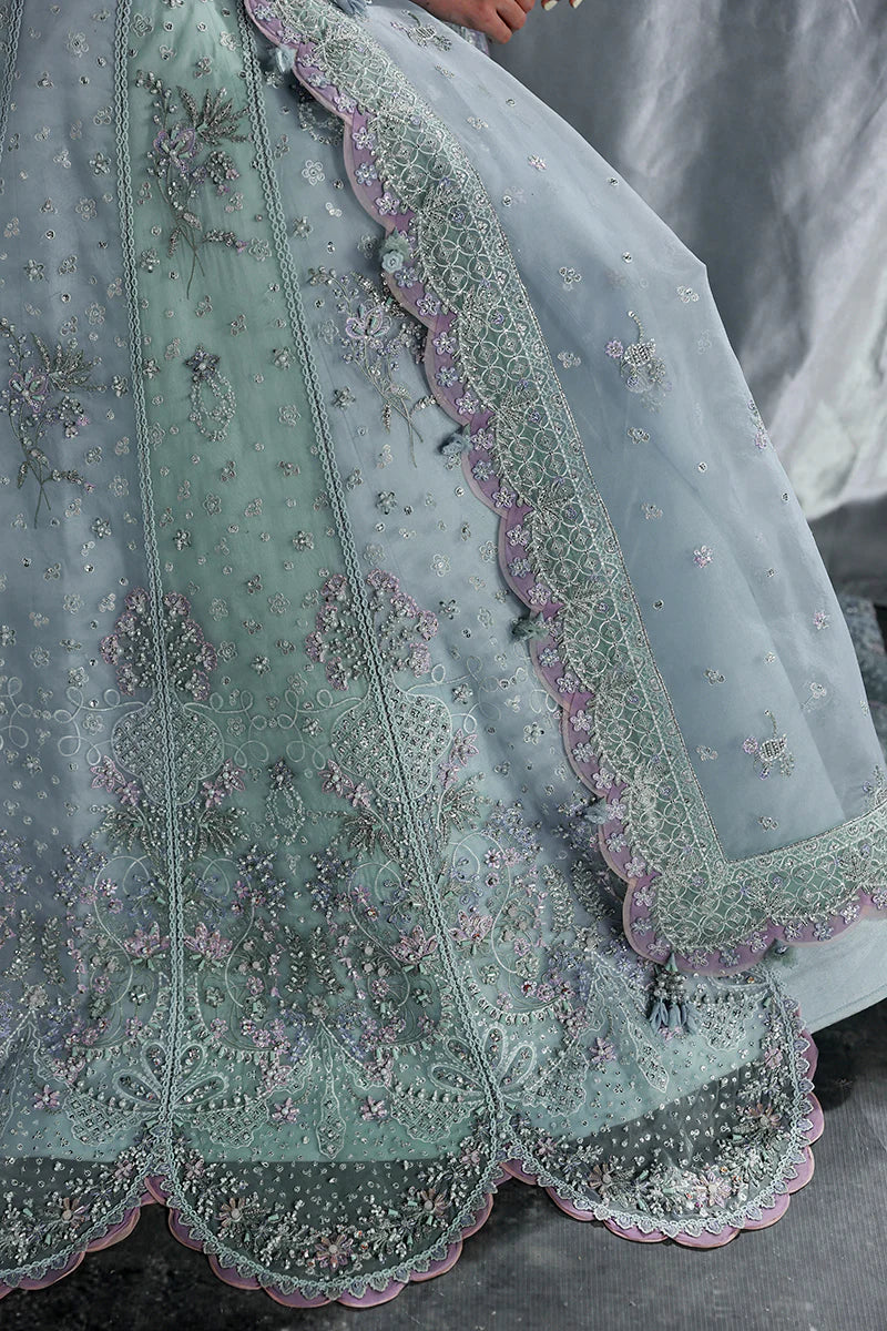 Model wearing MF-08 Serene Aqua by Qalamkar in aqua blue hand-embroidered dress – Pakistani luxury pret perfect for festive wear, shop online in UK.