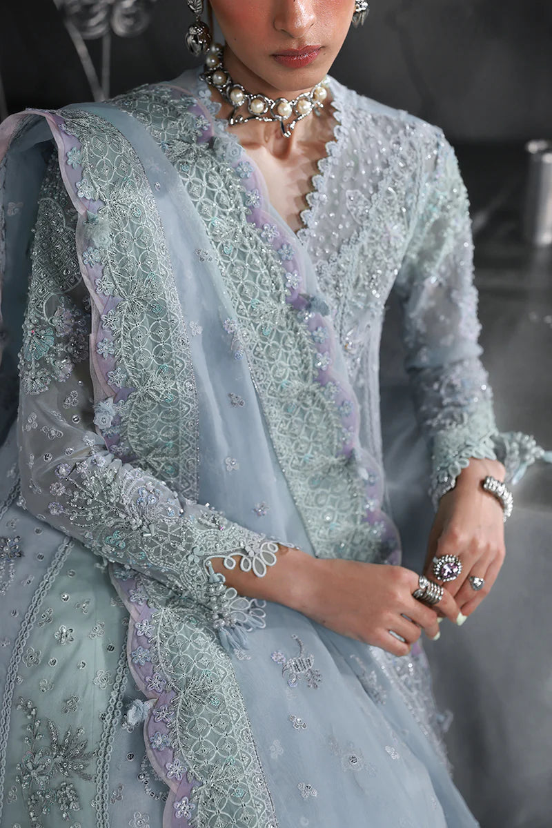 Model wearing MF-08 Serene Aqua by Qalamkar in aqua blue hand-embroidered dress – Pakistani luxury pret perfect for festive wear, shop online in UK.