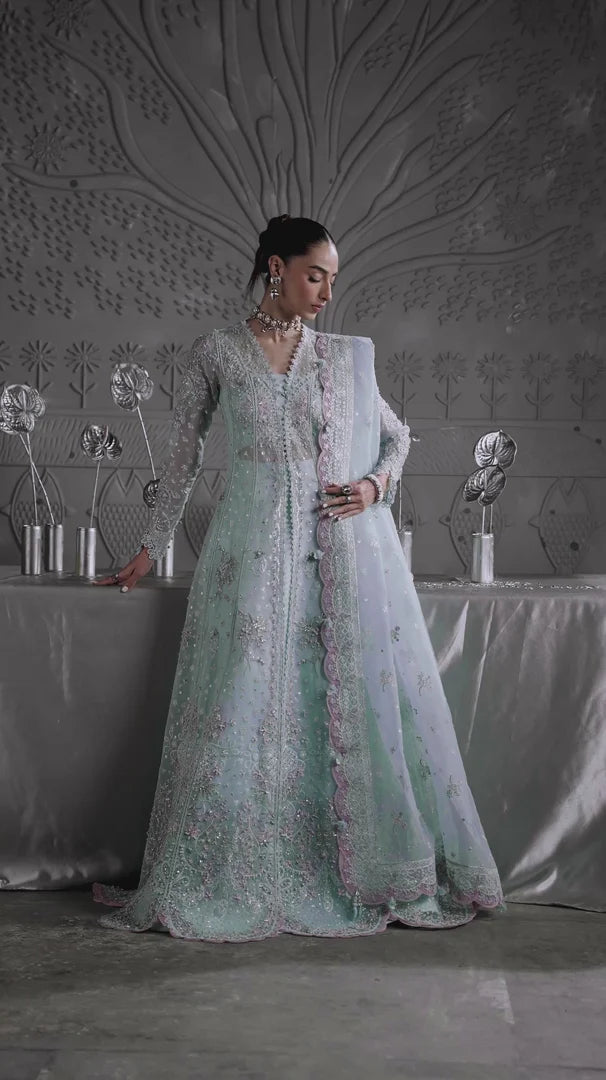Model wearing MF-08 Serene Aqua by Qalamkar in aqua blue hand-embroidered dress – Pakistani luxury pret perfect for festive wear, shop online in UK.