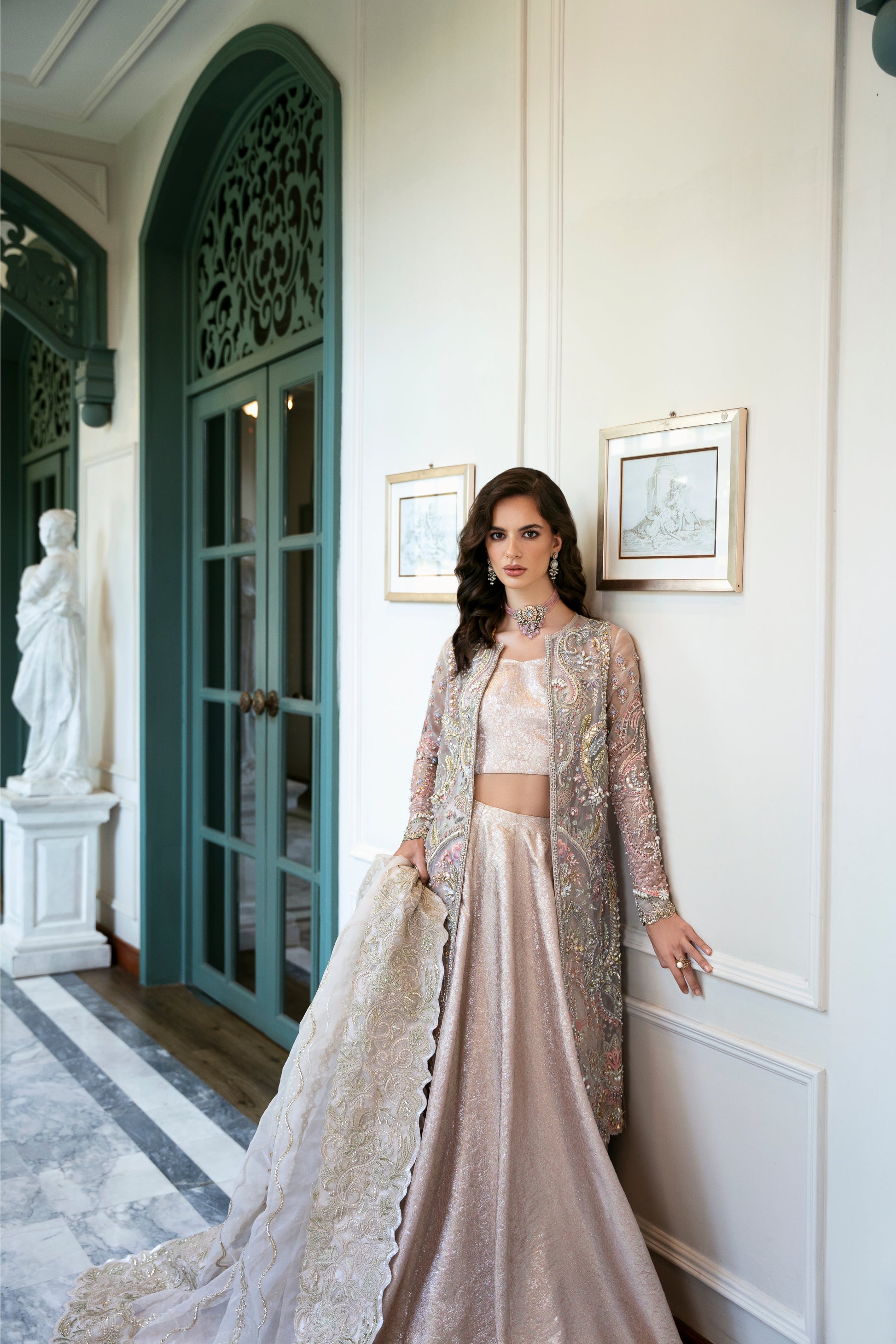 Model wearing Arsh from Mysie by Tahira, a stunning beige luxury pret outfit with intricate embroidery, perfect for Pakistani clothes in the UK.