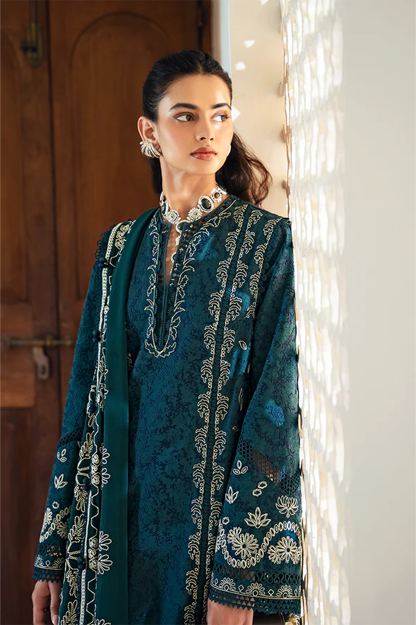 Model wearing peacock green embroidered dress from Suffuse Casual Pret 2025 Ivera. Pakistani luxury pret and Pakistani clothes online in UK.