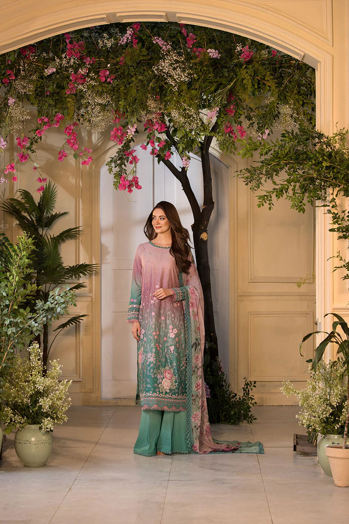 Model wearing ombre pink and teal embroidered dress from Sobia Nazir Vital 2025 Design 11A. Pakistani luxury pret and Pakistani clothes online in UK.