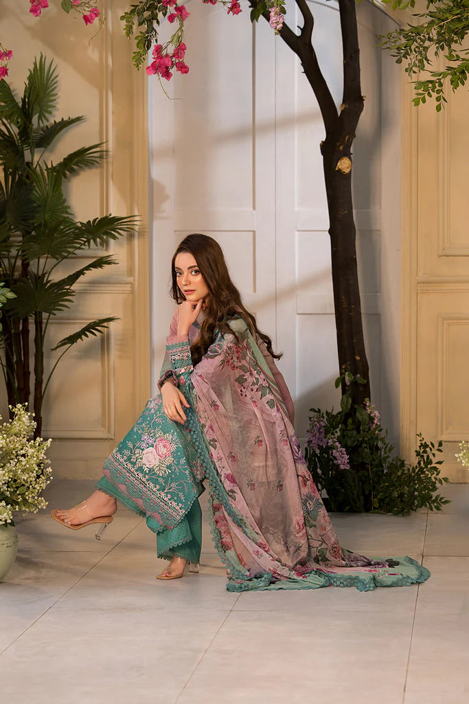 Model wearing ombre pink and teal embroidered dress from Sobia Nazir Vital 2025 Design 11A. Pakistani luxury pret and Pakistani clothes online in UK.