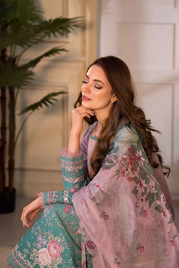 Model wearing ombre pink and teal embroidered dress from Sobia Nazir Vital 2025 Design 11A. Pakistani luxury pret and Pakistani clothes online in UK.