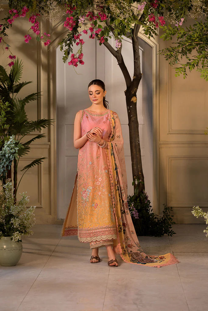 Model wearing peach and yellow embroidered dress from Sobia Nazir Vital 2025 Design 11B. Pakistani luxury pret clothes online in UK.